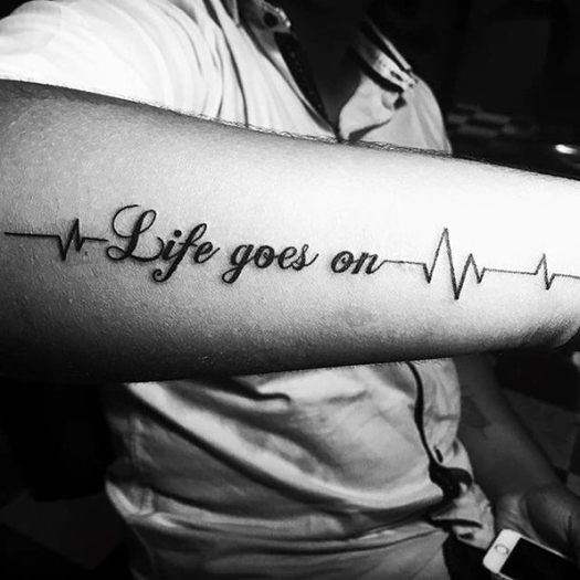 guys-life-goes-on-tattoo-design-ideas-on-outer-forearm (1)